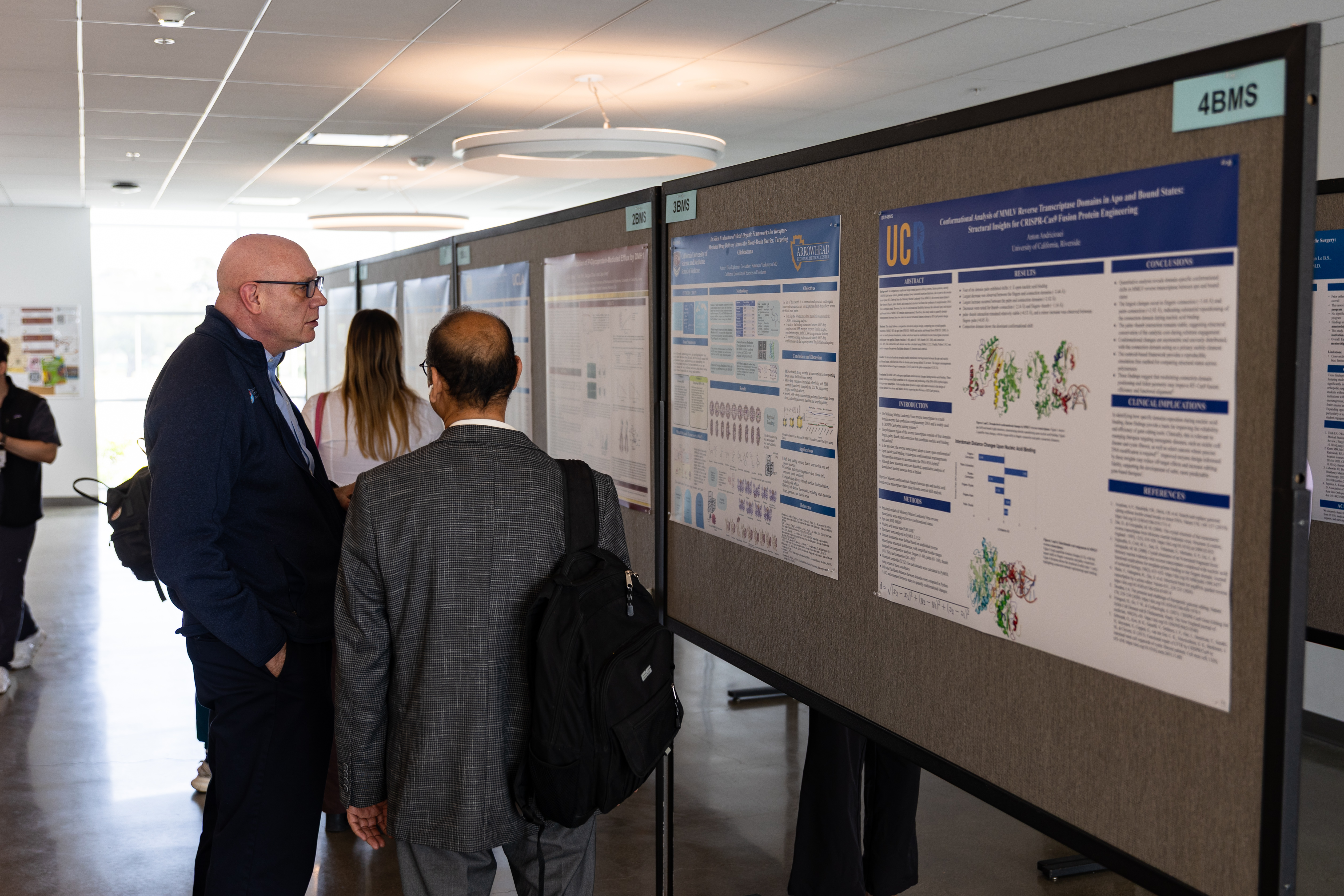 Dr. Lyons at research symposium